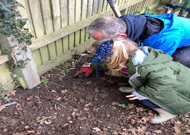 children planting a tree