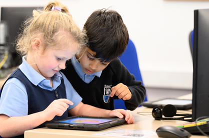 children working in the ICT suite