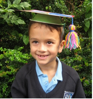 Boy wearing a crafted graduation cap