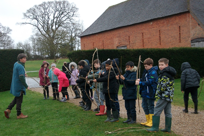 children with bows and arrows