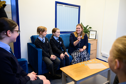 A prefects meeting with the head teacher