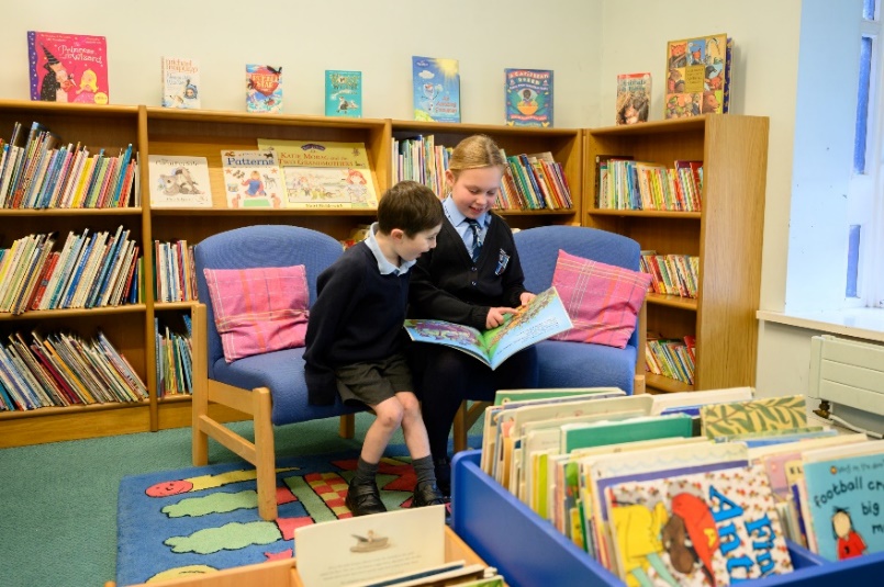 Children reading in the library