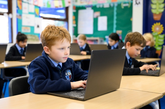 boy working on a laptop